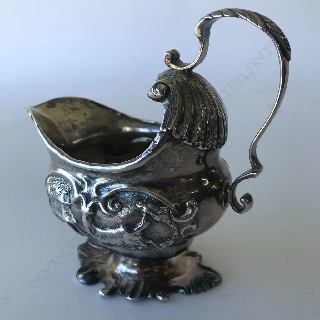 A rare George II silver creamer Image 1++