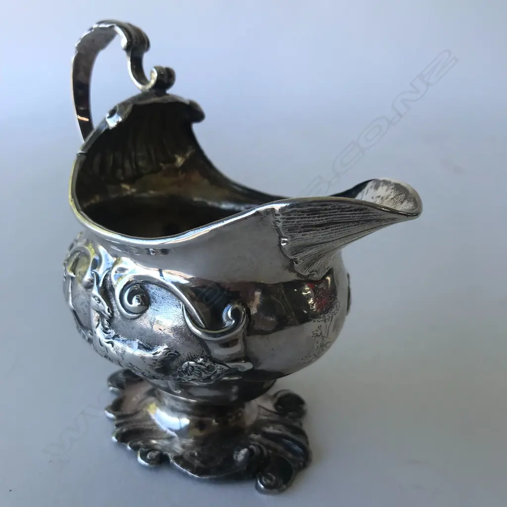 A rare George II silver creamer Image 1++