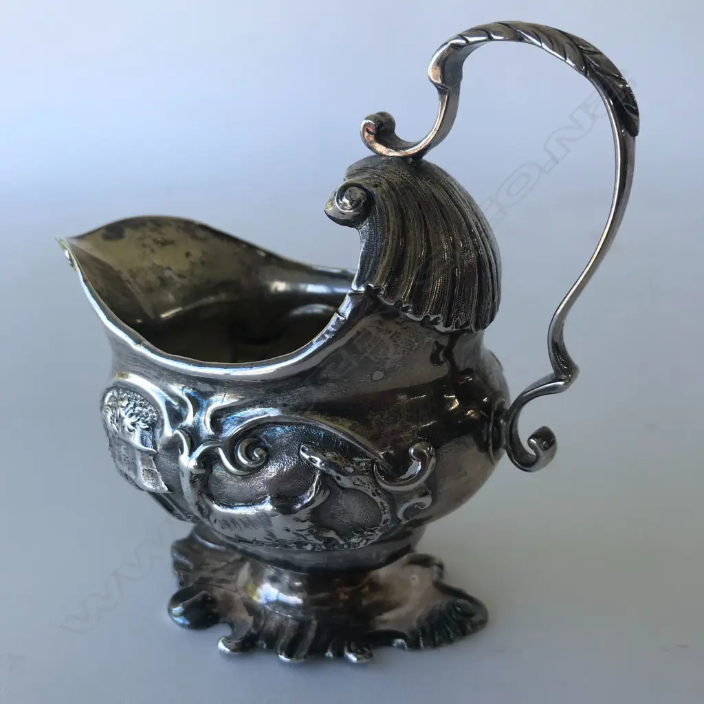 A rare George II silver creamer Image 1++