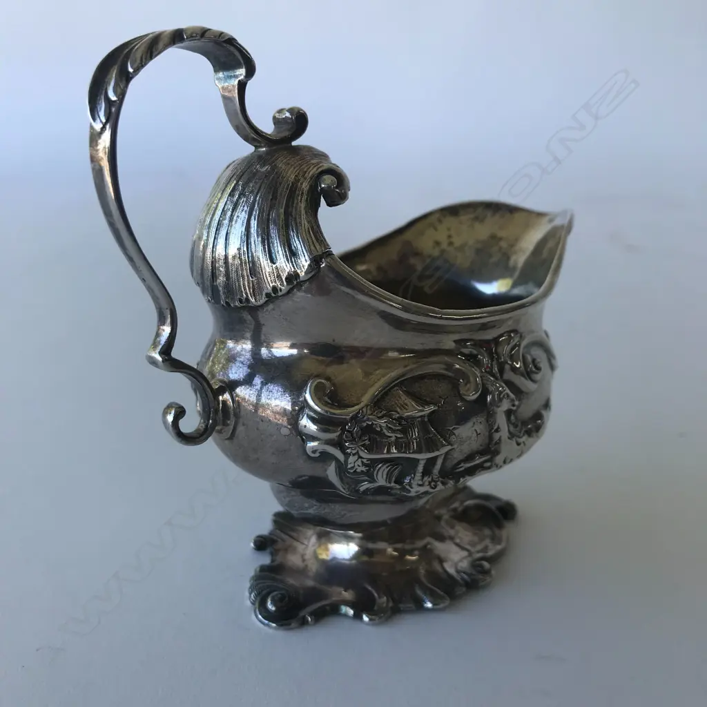 A rare George II silver creamer Image 1++