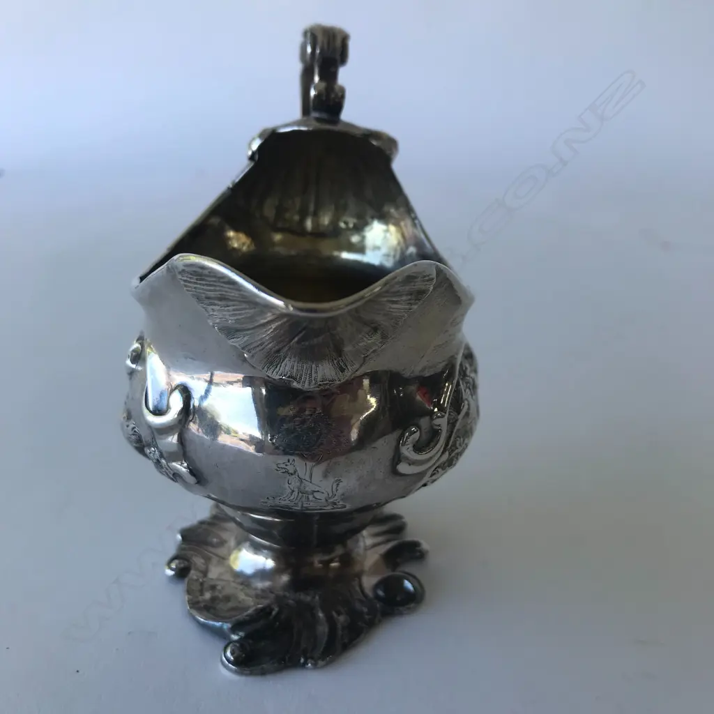 A rare George II silver creamer Image 1++