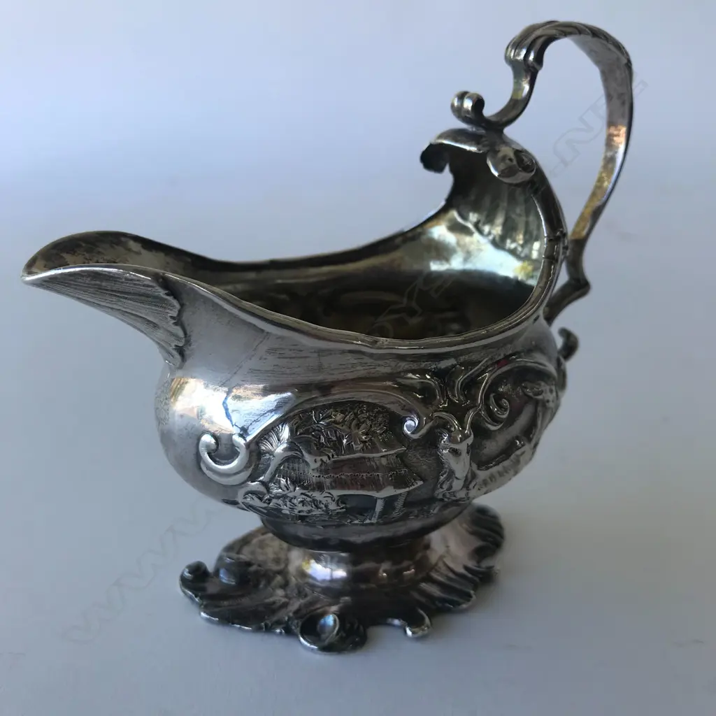 A rare George II silver creamer Image 1++