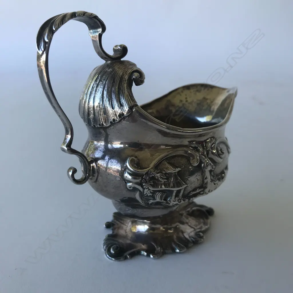 A rare George II silver creamer Image 1++