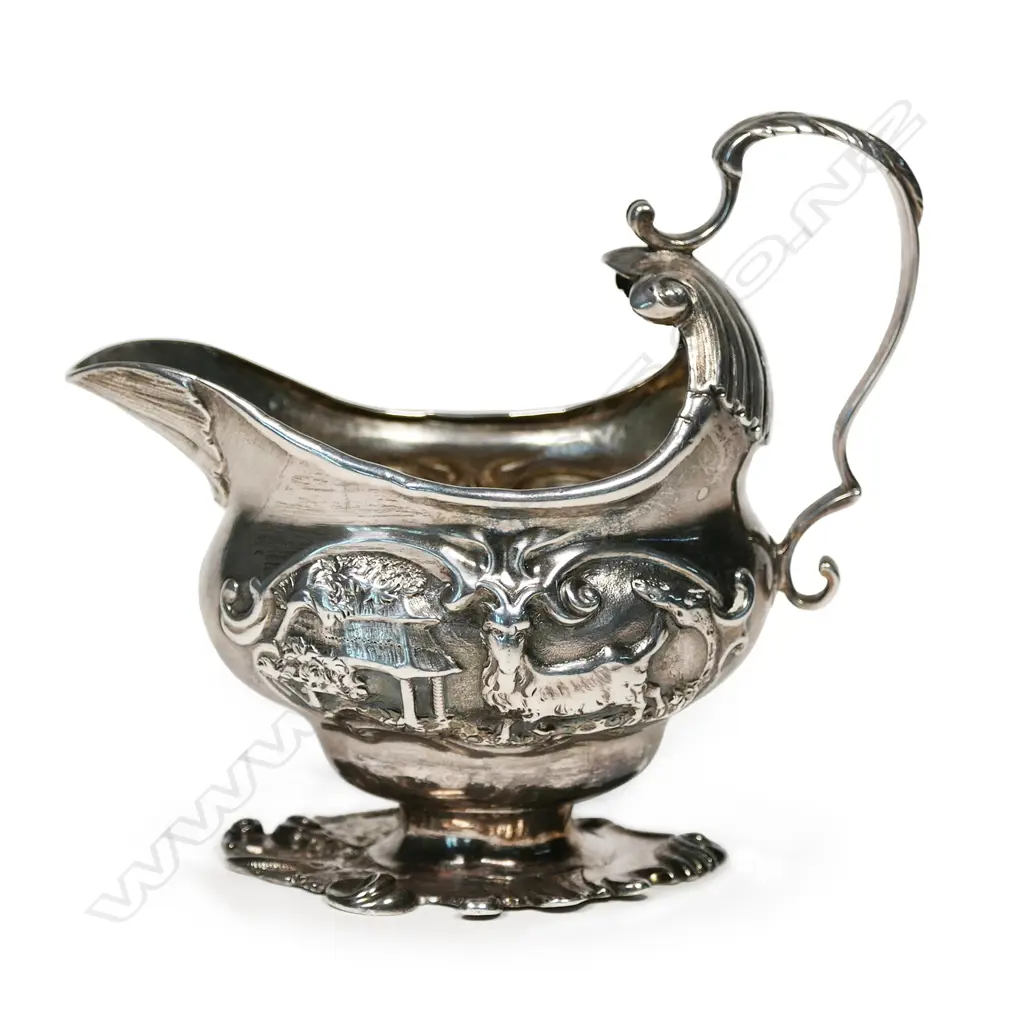 A rare George II silver creamer Image 1++