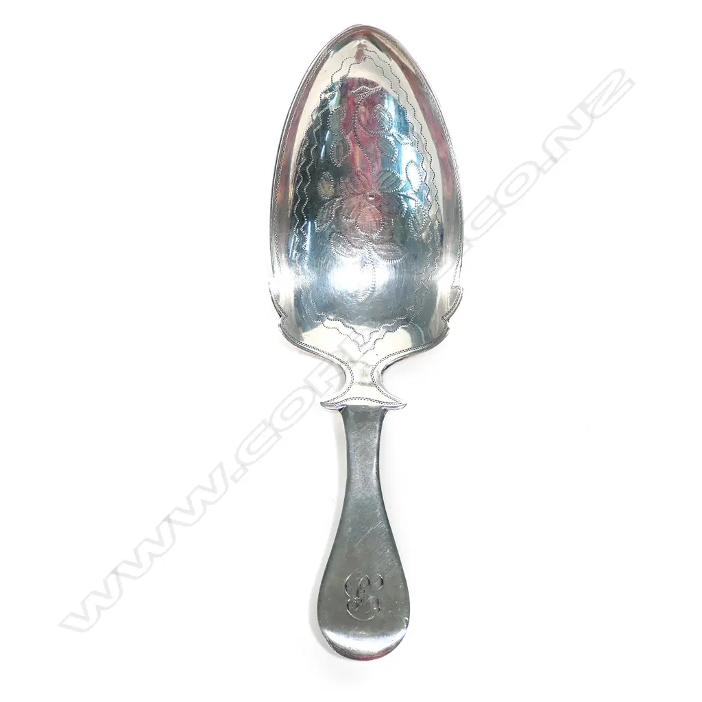 A large silver caddy spoon, Image 1++