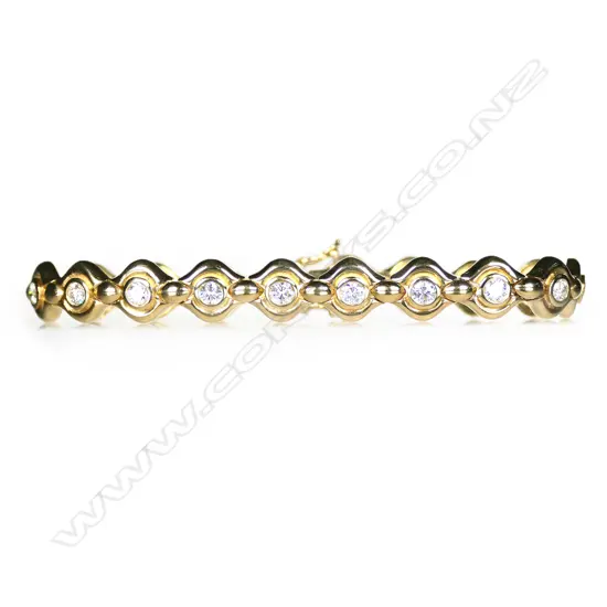 An 18ct gold and diamond bracelet,