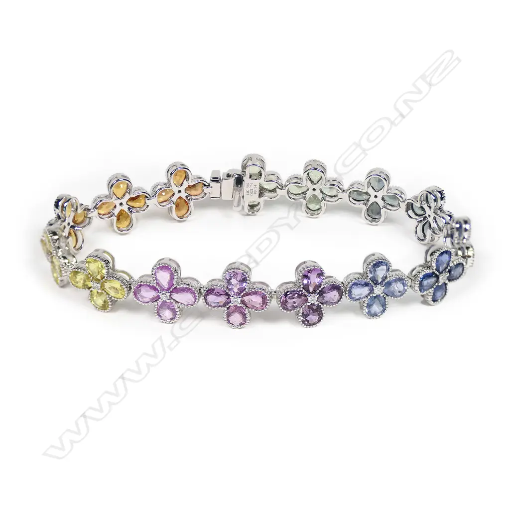 A 14ct white gold, sapphire and diamond multi-coloured floral design bracelet, Image 1++