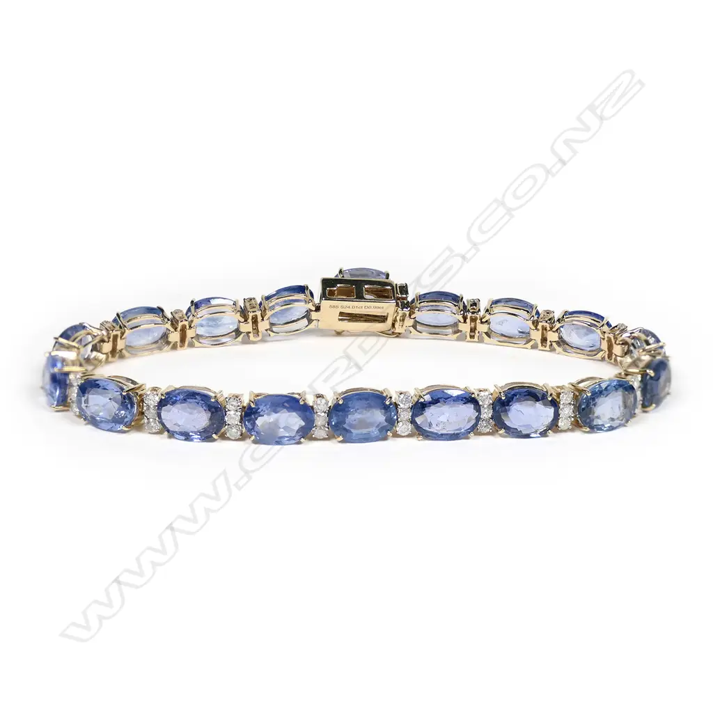 A 14ct gold, Ceylon sapphire and diamond tennis bracelet, Image 1++