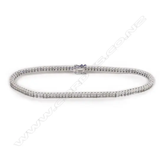 An 18ct white gold and diamond tennis bracelet,