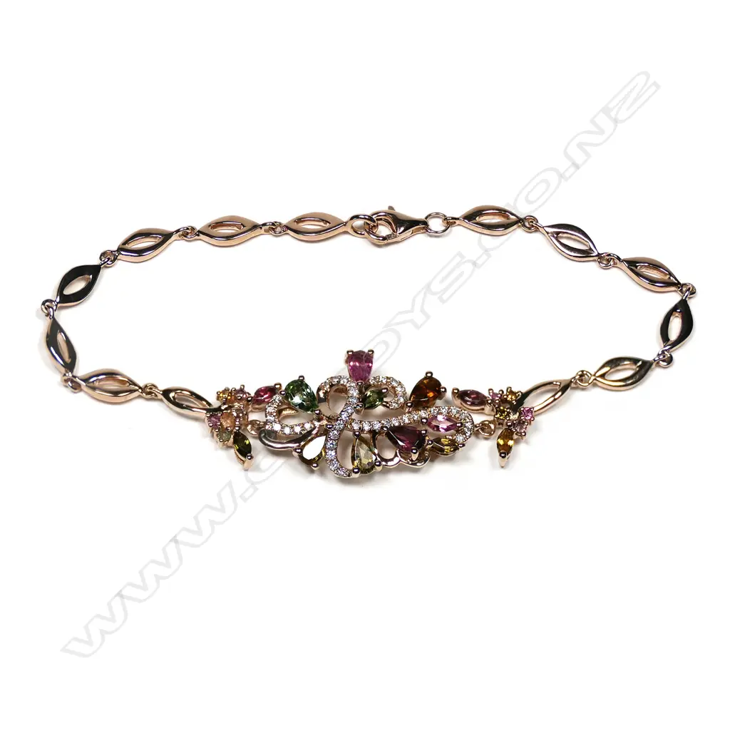 An 18ct rose gold diamond and tourmaline bracelet, Image 1++