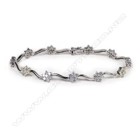 An 18ct white gold and diamond bracelet,