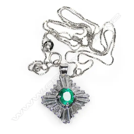 A 14ct white gold, emerald and diamond pendant,