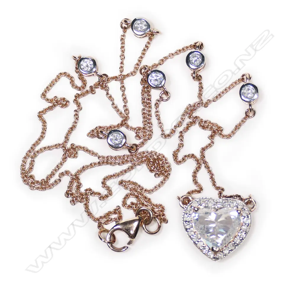 A 14ct rose gold and diamond heart pendant necklace, Image 1++