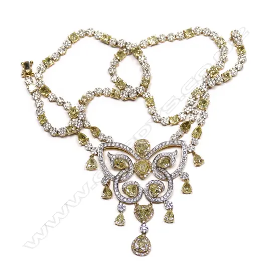 An impressive necklace of fancy yellow and white diamonds,