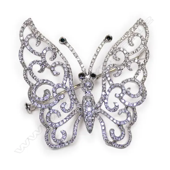 An 18ct white gold and diamond butterfly pendant/brooch,