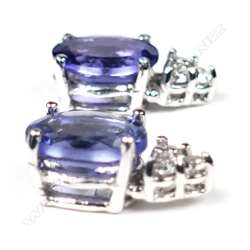 A pair of 14ct white gold, tanzanite and diamond stud earrings, Image 1++