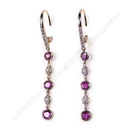 A pair of 14ct rose gold, ruby and diamond drop earrings