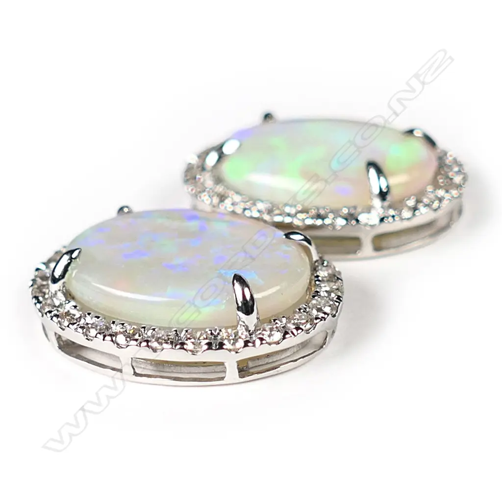 A pair of 14ct white gold, Andamooka opal and diamond stud earrings, Image 1++