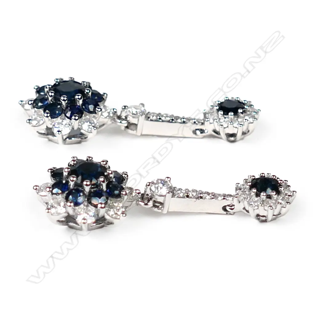 A pair of 14ct white gold, sapphire and diamond floral design drop earrings, Image 1++