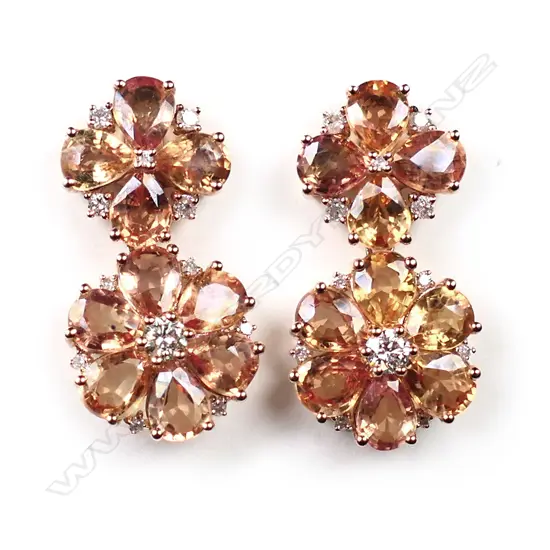 A pair of 14ct rose gold, orange sapphire and diamond floral design drop earrings,