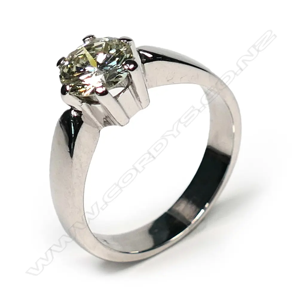 A 9ct white gold and diamond solitaire ring Image 1++