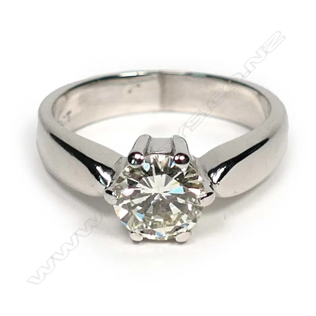A 9ct white gold and diamond solitaire ring Image 1++