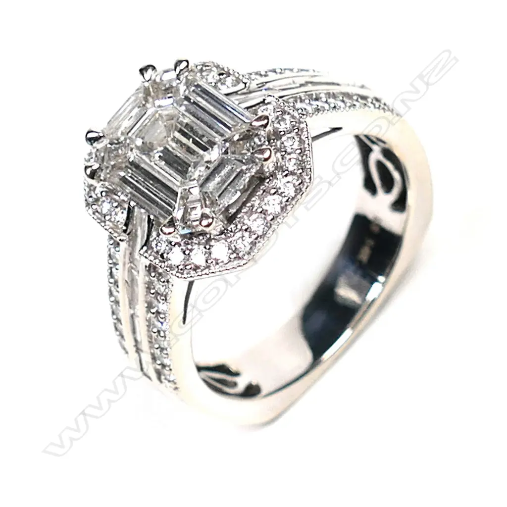 A 14ct white gold and diamond cluster ring, Image 1++