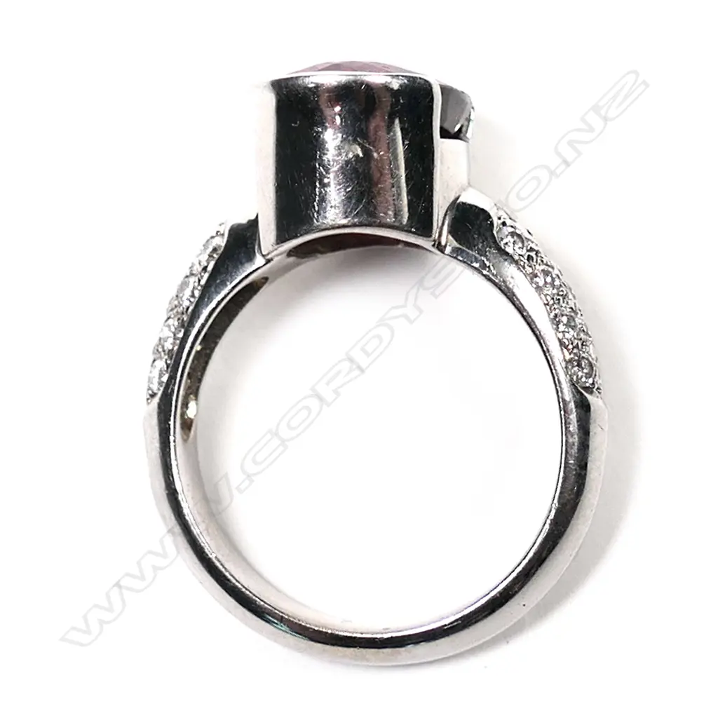 A 14ct white gold, rubelite and diamond ring, Image 1++