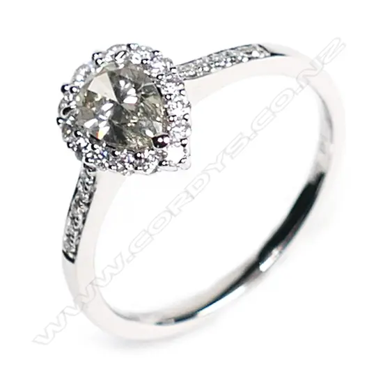 A 14ct white gold and diamond vintage style halo ring,