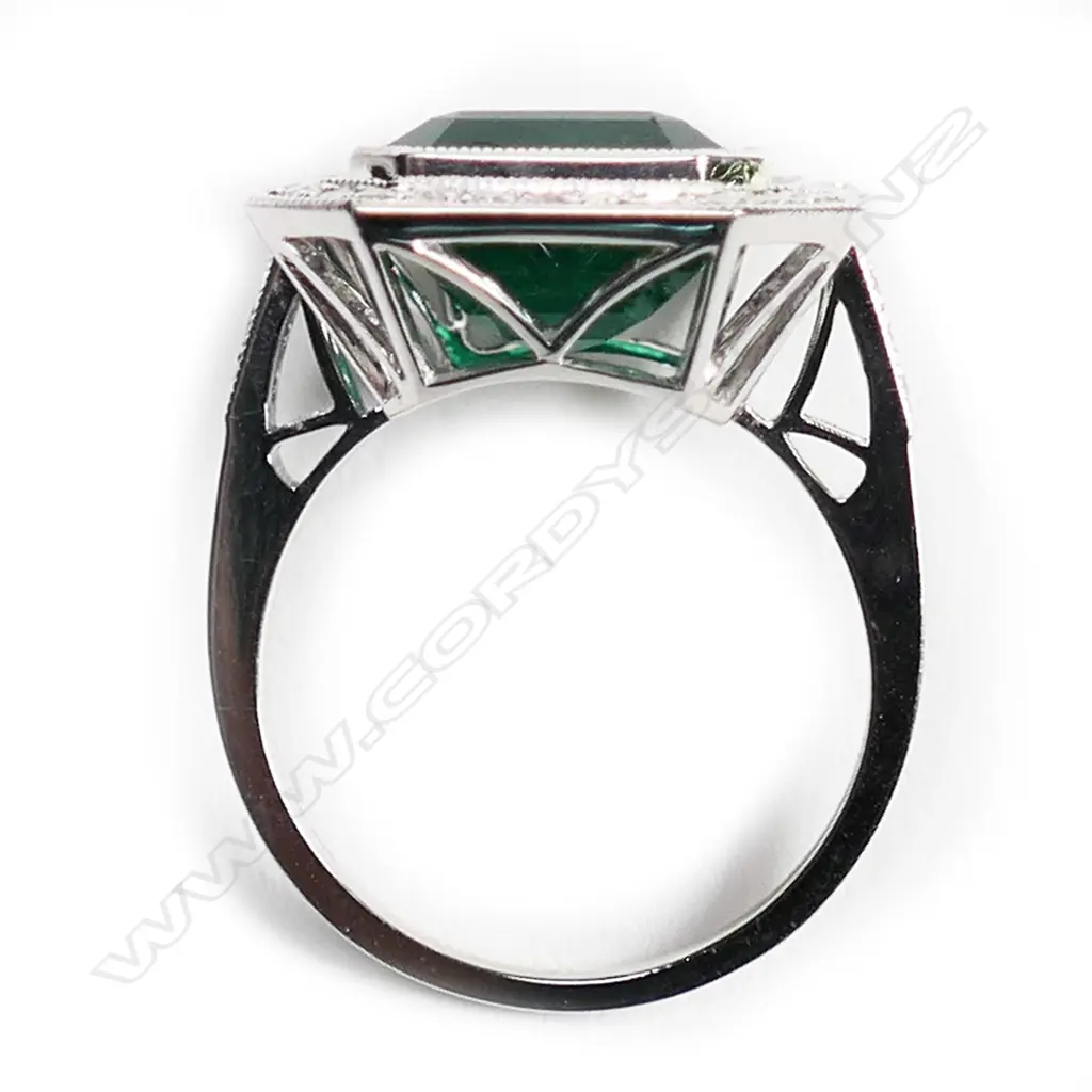A 14ct white gold, emerald and diamond Art Deco style halo ring, Image 1++