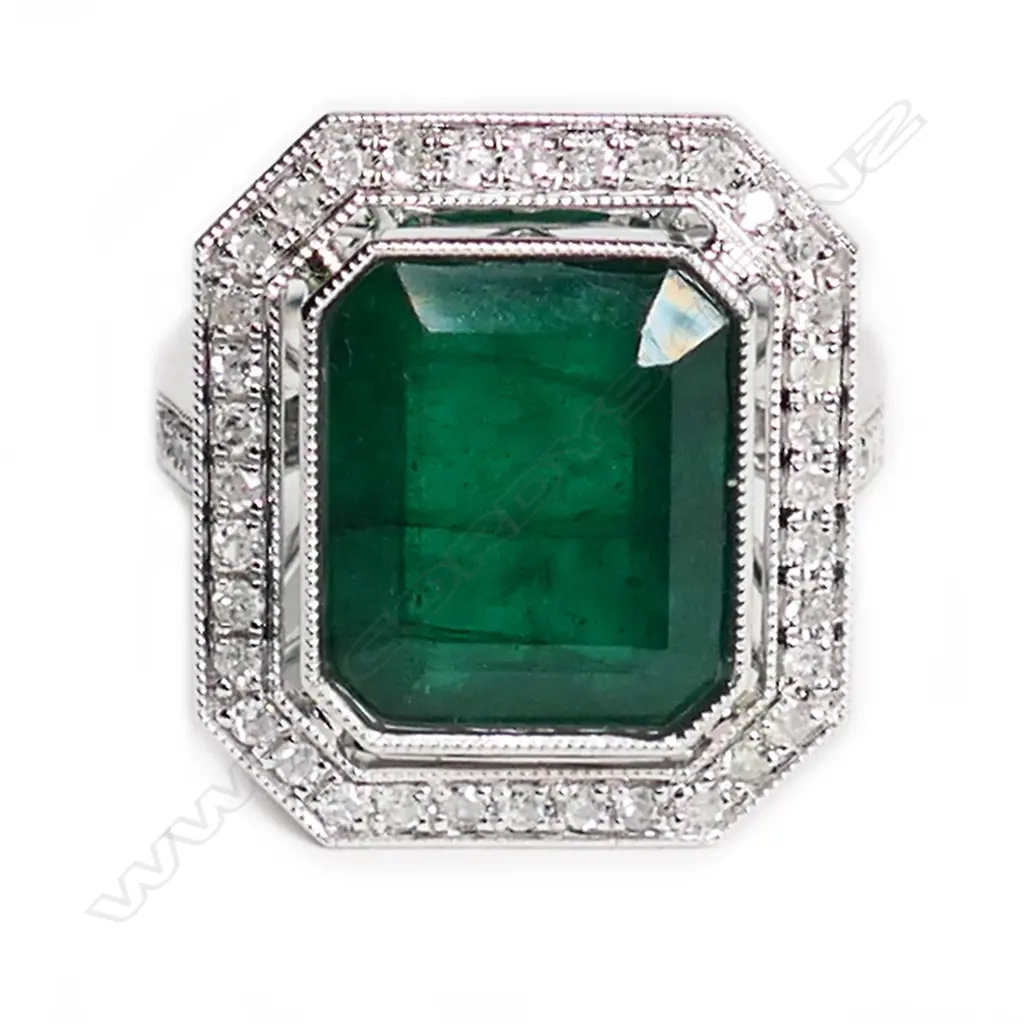 A 14ct white gold, emerald and diamond Art Deco style halo ring, Image 1++