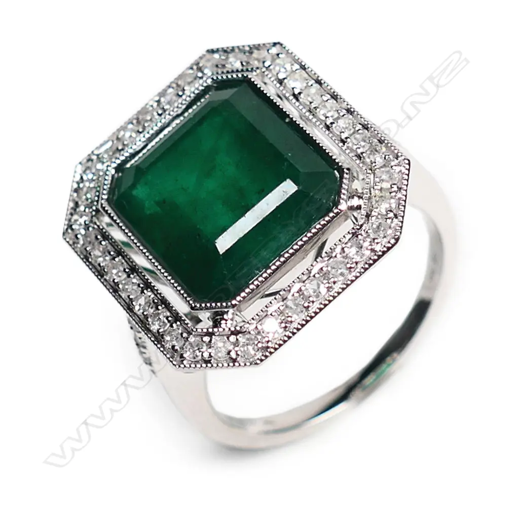 A 14ct white gold, emerald and diamond Art Deco style halo ring, Image 1++