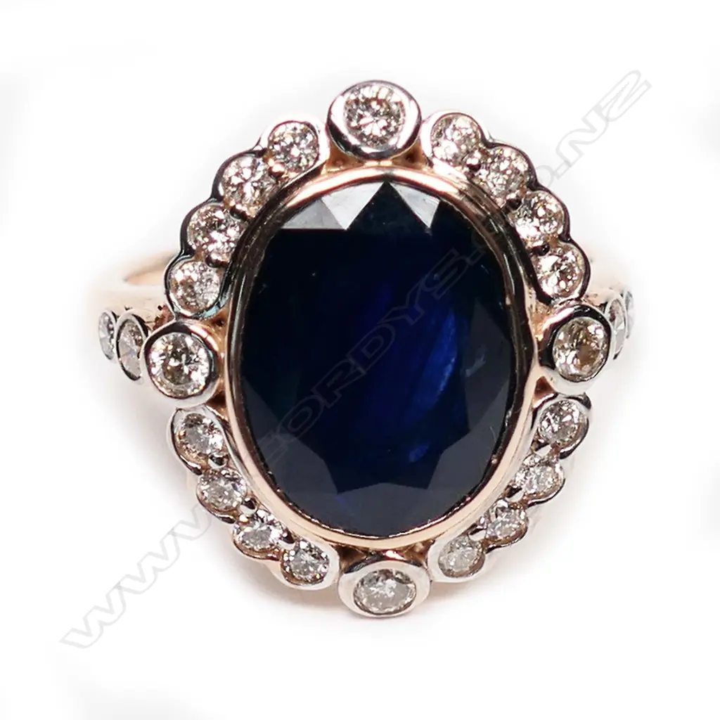 A 14ct rose gold, sapphire and diamond antique style halo ring, Image 1++