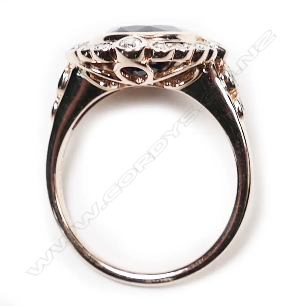 A 14ct rose gold, sapphire and diamond antique style halo ring, Image 1++