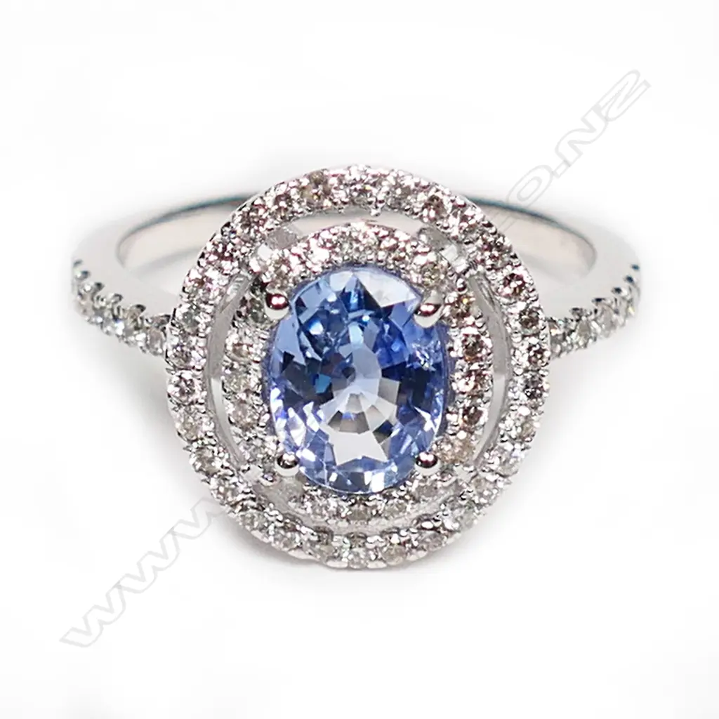A 14ct white gold, Ceylonese sapphire and diamond double halo ring, Image 1++