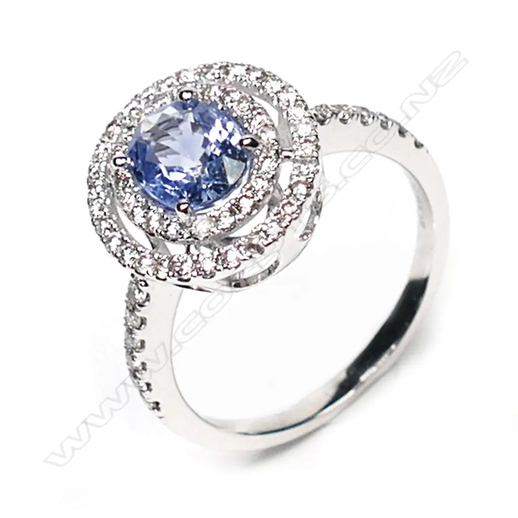 A 14ct white gold, Ceylonese sapphire and diamond double halo ring, Image 1++