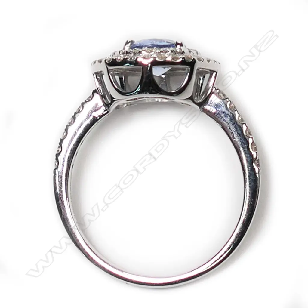 A 14ct white gold, Ceylonese sapphire and diamond double halo ring, Image 1++