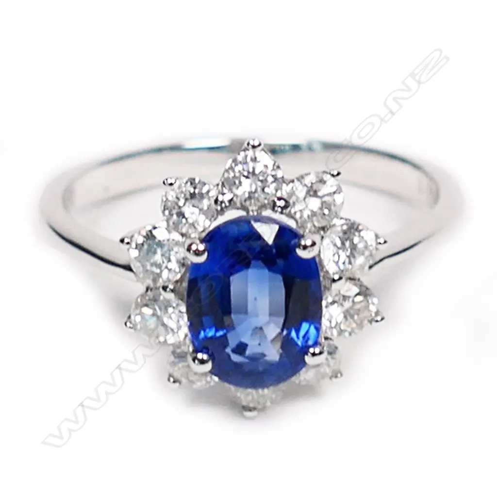 An 18ct white gold, sapphire and diamond ring, Image 1++
