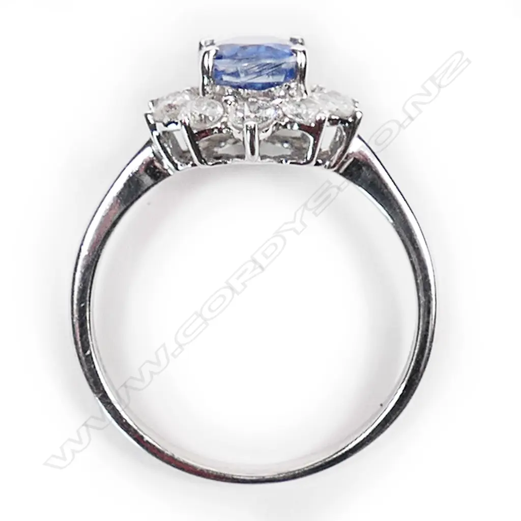 An 18ct white gold, sapphire and diamond ring, Image 1++