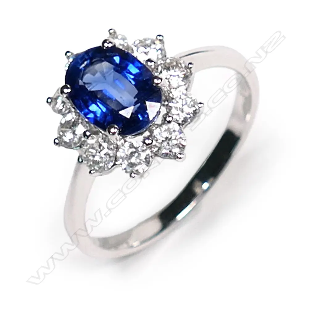 An 18ct white gold, sapphire and diamond ring, Image 1++
