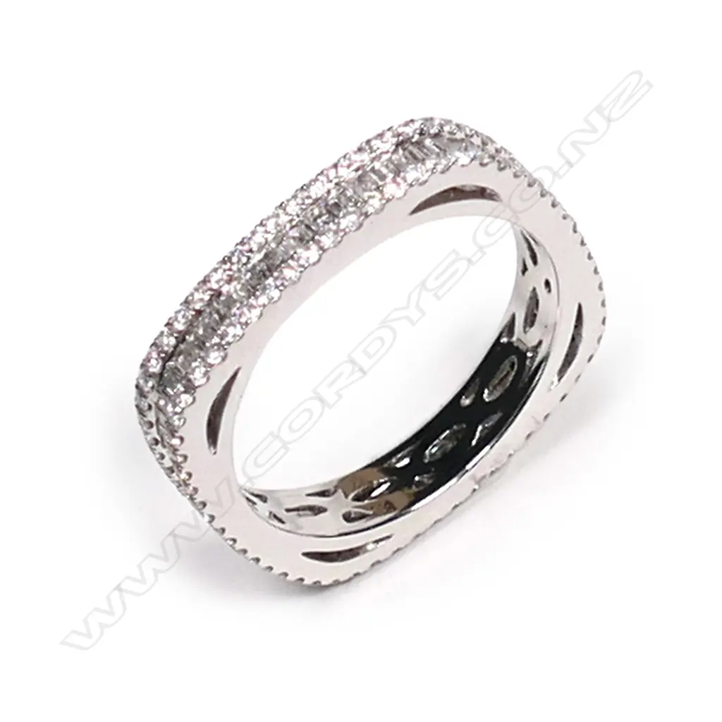 An 18ct white gold and diamond set band, Image 1++