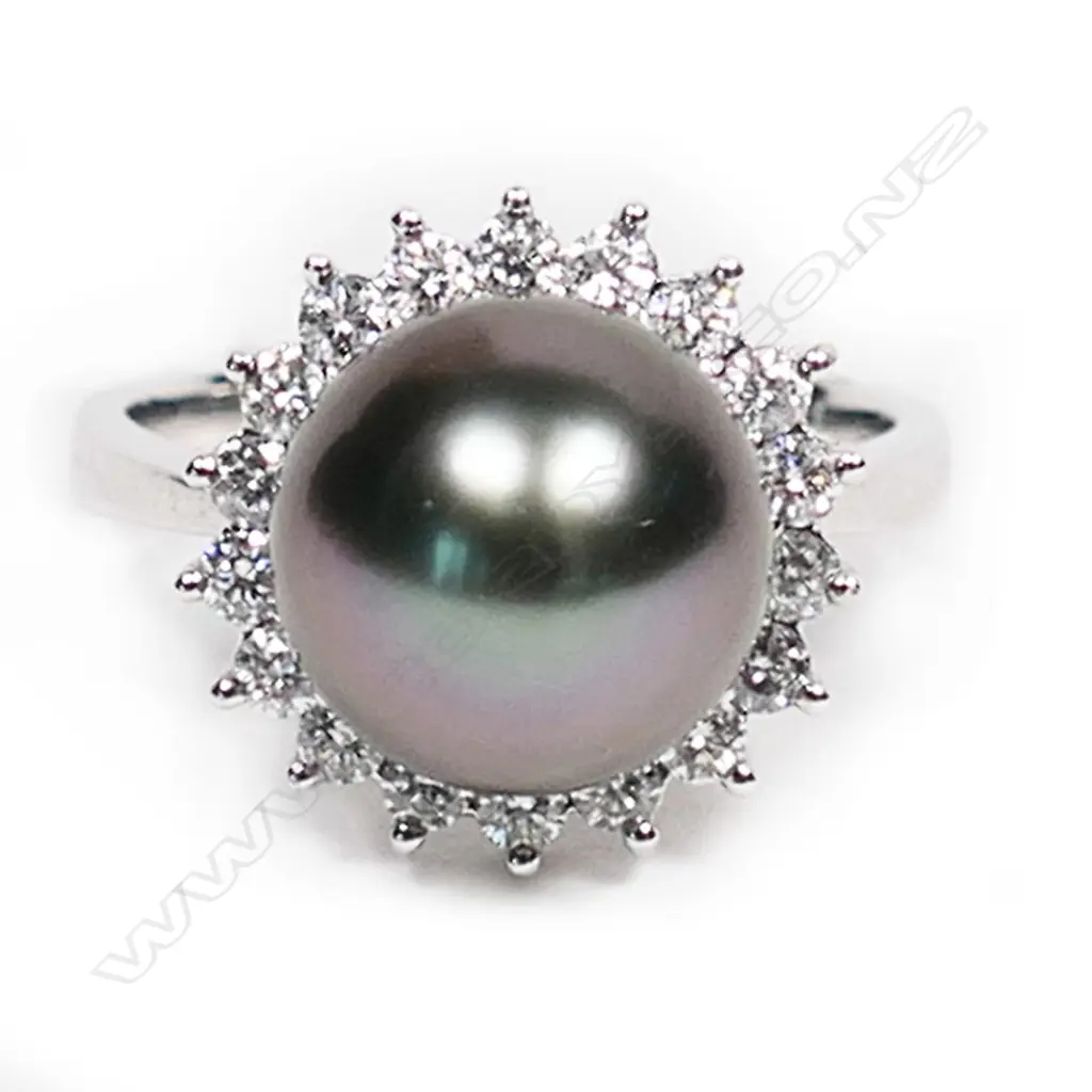 An 18ct white gold, diamond and pearl ring, Image 1++