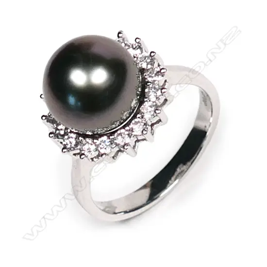An 18ct white gold, diamond and pearl ring,