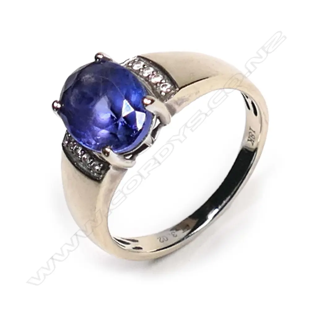 An 18ct white gold, tanzanite and diamond ring, Image 1++