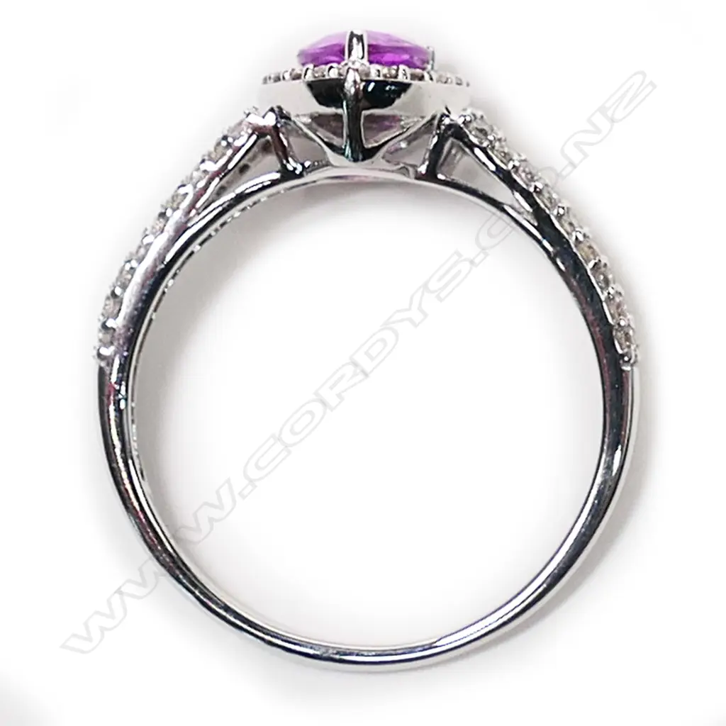 A 14ct white gold pink sapphire and diamond vintage style halo ring, Image 1++