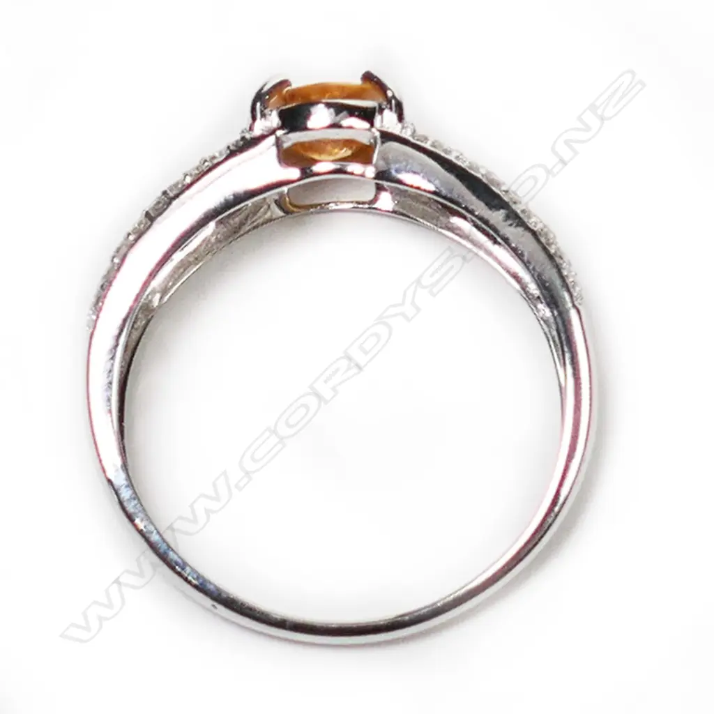 A 14ct white gold, yellow sapphire and diamond ring, Image 1++