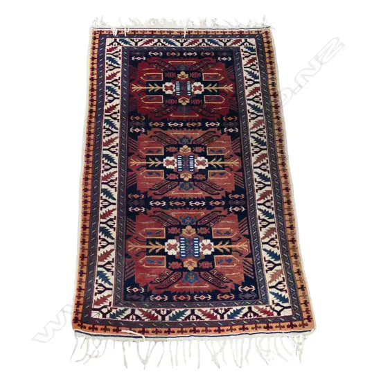 A Caucasian wool rug,