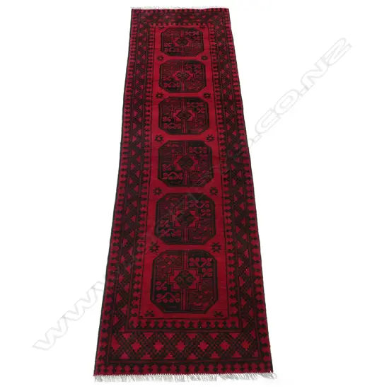 An Afghan hand knotted runner,