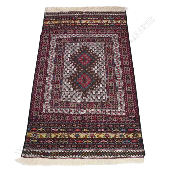 A Sumak flat weave rug,