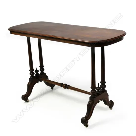 A Victorian walnut side table